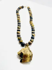 17” Wire Wrapped Raw Tigers Eye Choker Necklace Adorned With 10mm Matted Tigers Eye Beads17” Wire-Wrapped Raw Tiger’s Eye Choker – Grounded, Bold & Fierce By Mad Mellow | Handcrafted Crystal Jewelry for the Wild & Rooted