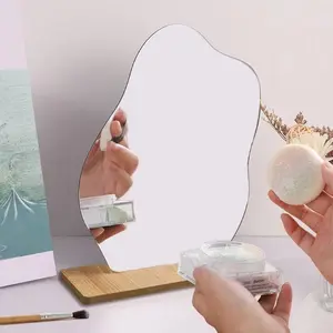 Acrylic aesthetic room decoration desktop mirror, with irregular frameless and asymmetrical design, cute wall-mounted mirror, suitable for minimalist offices and living rooms, for makeup touch-ups, photography, and DIY projects.
