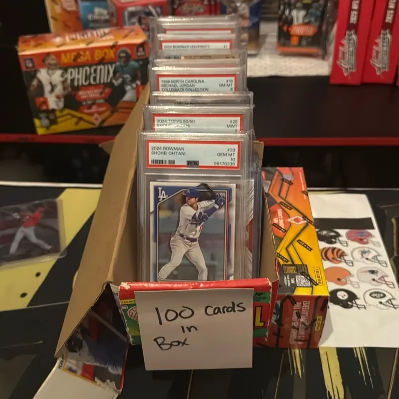 Chaser Box 3 Pulls - Cards in 35 point top loader 3 pulls a lot of numbered patches or autographs. A bunch of graded also.
