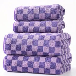 One set of quick-drying absorbent checkered bath towel set. Cross-border bath towel combination. Soft and skin-friendly. Super absorbent towel