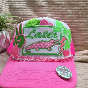 Later Gator foam snapback trucker hat in neon pink and neon green.