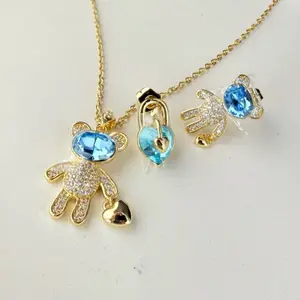 Fine chain with bear pendant and erring 18 inches + 2 inches extension