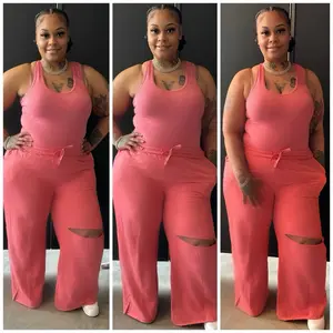 Slit Pant Set Includes Bodysuit Top and Pants Model is wearing size 3x 18/20