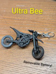 Keychain Surron Ultra Bee (3D PRINTED) Scale Electric Dirt Bike Keychain 3D Printed Surron Desk Toy Hotwheels Finger Bike
