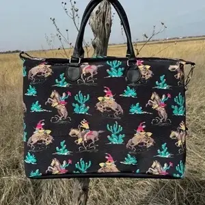 Wanted & Wild XL Tote | Western Printed design in classic black Strap: 26”- 59” L20” X W9.75” X H15”
