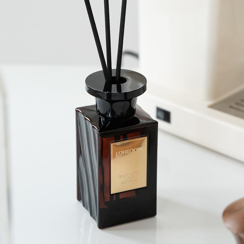 ENCHANTED Woody Reed Diffuser Set 5 oz (150ml) Oriental Woody Scented Diffuser with Sticks Home Fragrance for Bathroom Shelf Decor by lonkoom Aroma Floral Gift Oil Freshener Flower