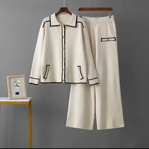 Elegant cream knit suit with black trim - women's long sleeved jacket and wide leg pants