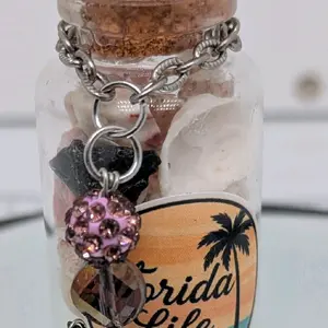 Handcrafted genuine authentic one of a kind Florida Before Us shark tooth filled trinket bottle ornament featuring a wire wrapped shark tooth pendant by ToothRaiders