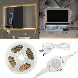 Smart motion sensor LED light strip, available in warm/white colors, USB powered, automatic switch. Suitable for kitchen, wardrobe, staircase, bedroom, and living room motion-sensor lighting.