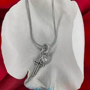 Agape. Charm necklace meaning unconditional love.