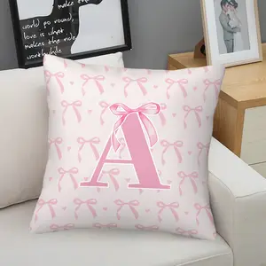 Pink Bow Throw Pillow, Custom Initial Heart Print, Soft Durable Decorative, Perfect for Sofa Bed Bedroom Decor (With Filling)