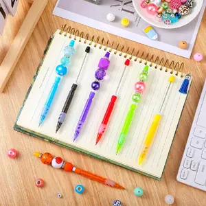 x5 mechanical pencils click on the top to dispense the pencil. for beading diy you will receive x5 mixed colors. they are plastic with sparkles. super popular.  Plastic. Beads sold separately.