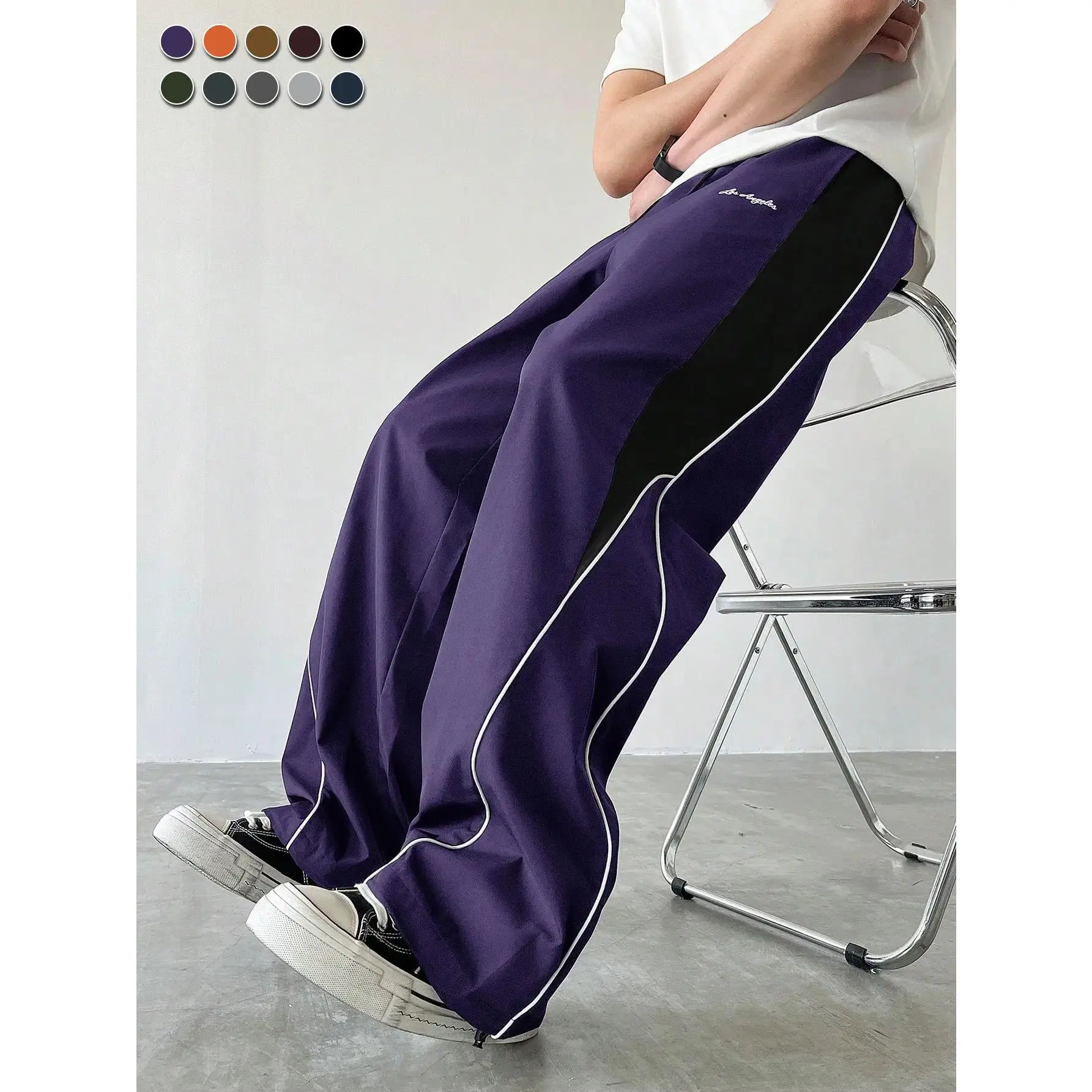 Men's Colorblock Wide-Leg Casual Pants - Contrasting Reflective Strips, Pendant Accent, Smooth Fabric, Side Stripes, American Urban Streetwear, Comfy Fit, Daily Commuting Bottoms