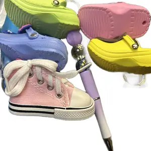 Shoe Keychain (Claim on Live Only) Choking hazard due to small parts.