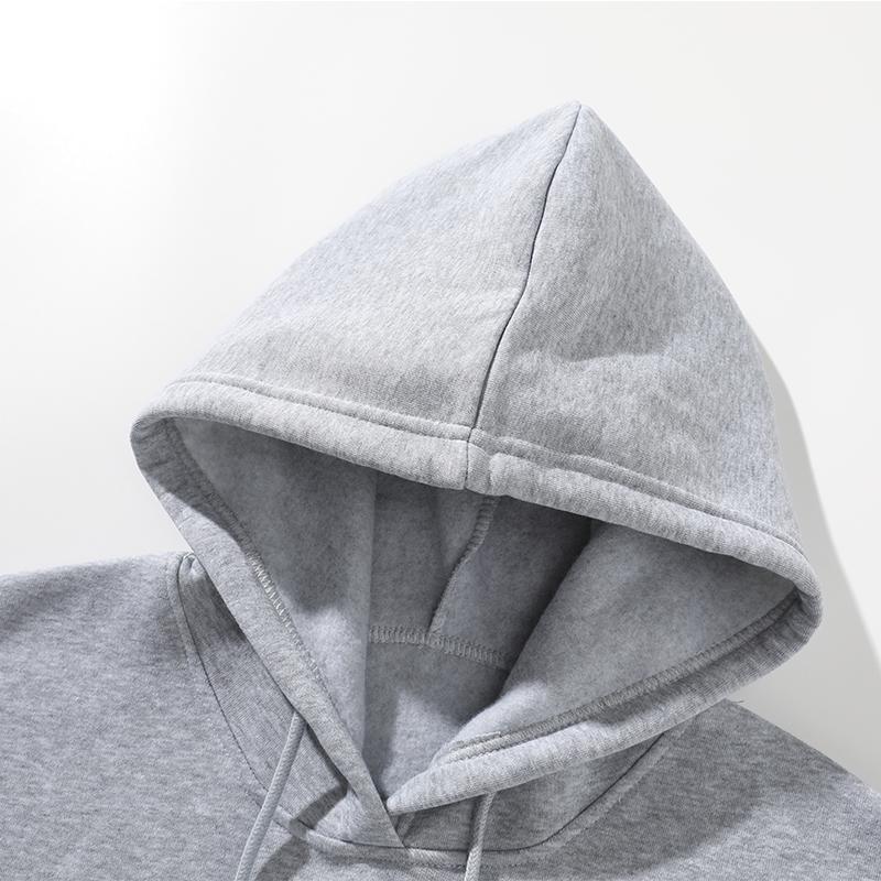 Women’s solid-color hooded sweatshirt  featuring a loose-fit long-sleeve pullover hoodie and straight wide-leg sweatpants; a casual, warm two-piece outfit for everyday wear. matching sets women fall