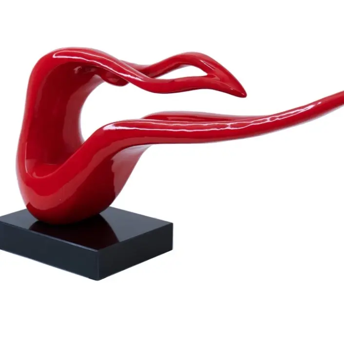 Red silhouette sculpture with marble base 27”