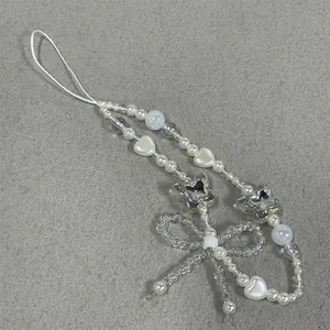 Fashion pearl bow mobile phone strap keychain with phone case creative bead camera wristband accessories Phone Lanyard Phone Charms