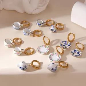 Ceramic blue and white porcelain earrings, cups, plates, flower pendants, and ear studs