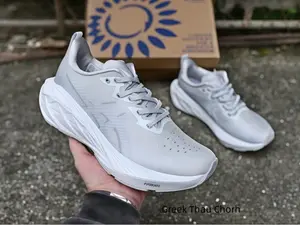 All light gray mesh running trainers with sculpted cloud white curved cushion midsoles