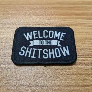WELCOME to the SHOW funny 2"x3" morale patch with hook and loop backing green background