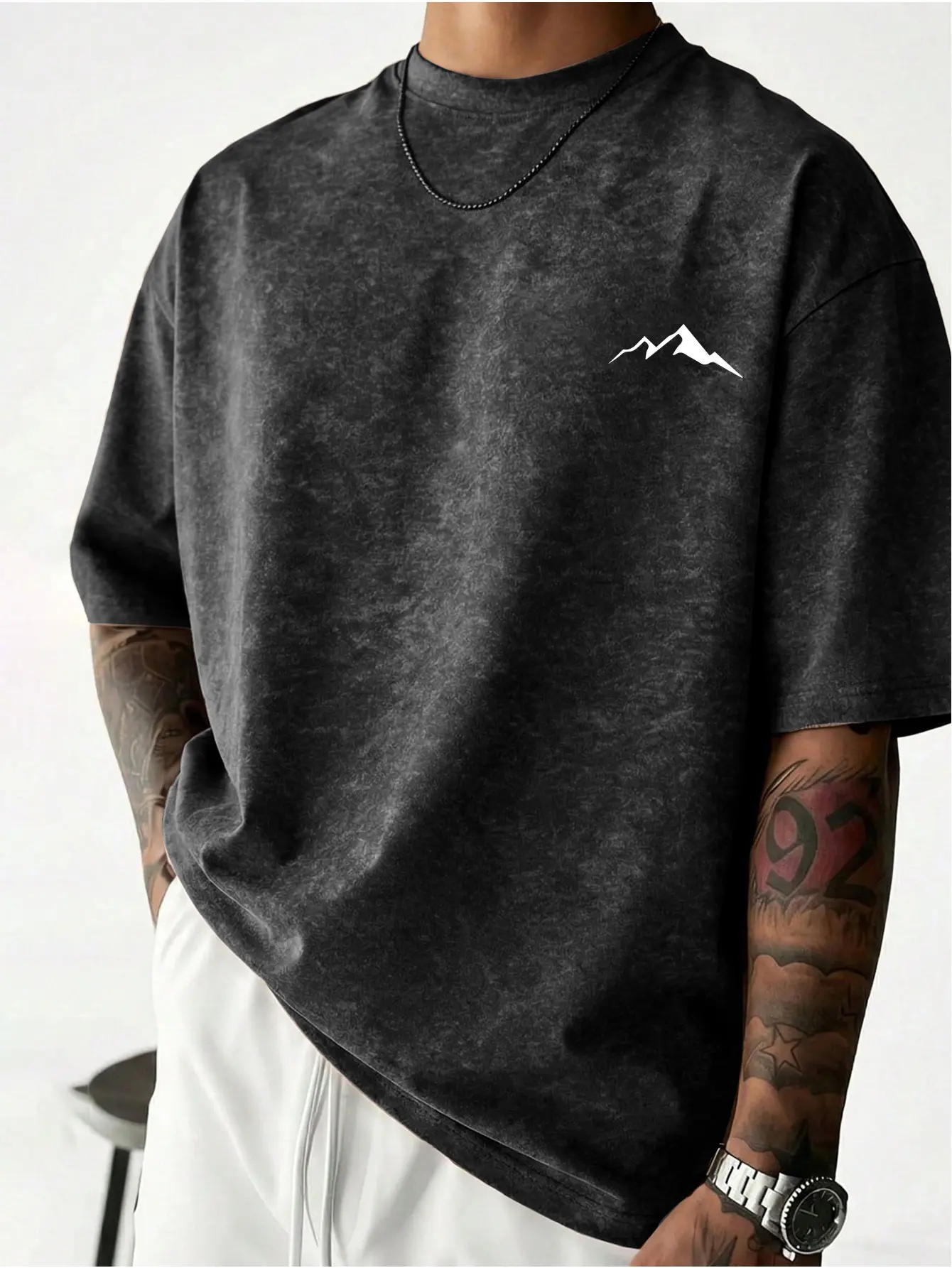 High street men's casual streetwear short-sleeved T-shirt with a minimalist mountain peak print design