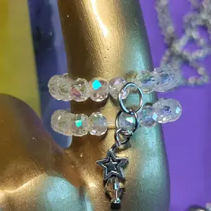 Lady Emjay's VERY FIRST Handmade Stretchy, Charmed rings. with Iridescent  and sparkling translucent beads. Charmed with a star