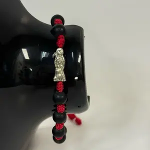 Pulcera Reversible Roja y Negra de La Santa Muerte with Silver Bead and Red Cord for Unique Style