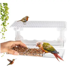 Transparent window bird feeder, perfect for outdoor birdwatching - Three-compartment transparent aviary with strong suction cups and a removable tray - Easy-to-install garden bird feeder, window feeder for close-up bird observation.