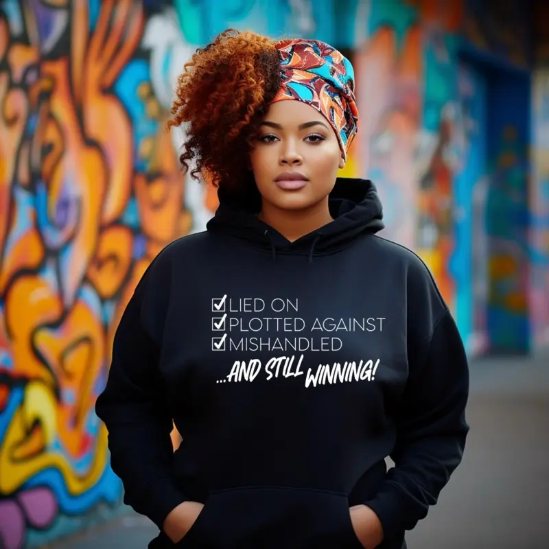 Women's Biblical-Themed Casual Hoodie - "Lied On, Plotted Against, Mishandled... and Still Winning" - Women's Tops, Sweatshirts, Biblical-Themed Women's Hoodies, Casual Women's Hoodies
