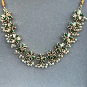 Imitation Ethnic Necklace with Green Leaf Design, Gold Accents, and Beads