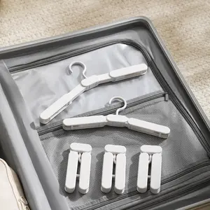 3-pack portable folding travel hangers, mini foldable hangers, comes with 12 clips, suitable for travel, business trips, hotels, RVs, camping, space-saving luggage hangers