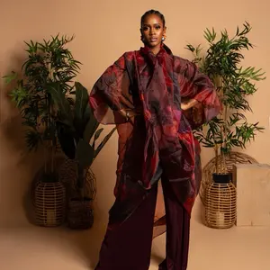 Kimono and Pants (Sold as a set)  Pants  Elastic on the waist Zipper pockets Pleated design Model 5feet 7inches, wearing size US small Pants length 46” Kimono  Made with Organza fabric Designed as a loose fit Model 5feet 7inches, wearing size US small