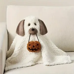 A cute cartoon dog Halloween throw pillow - soft plush white striped decorative cushion with a pumpkin bucket, hand wash only, no batteries required, suitable for home decoration and horror season embellishment