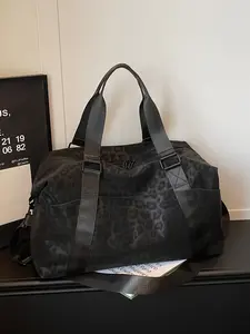 Lao Qianfeng Khaki Leopard Print Short Trip Bag Waterproof Nylon Large Capacity Luggage Bag Trolley-Compatible Commuter Gym Backpack for Students New Back-to-School Style