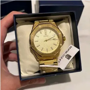 Montres Prestige Gold Watch 44mm - Stainless Steel Band & Elegant Dial Design