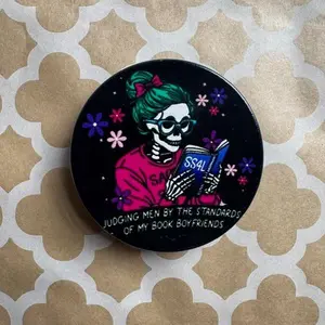 Sacred Sister Reading Skull - Phone/ E-reader Grip / Accessory with Unique Reader Design "Judging Men by the Standards of My Book Boyfriends"