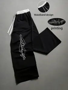 Unisex Y2K street-style athletic pants—casual loose-fit drawstring pants with black-and-white contrast and a faux two-piece belt design featuring unconventional font prints. These relaxed straight-leg pants are very comfortable to wear and perfect for eve