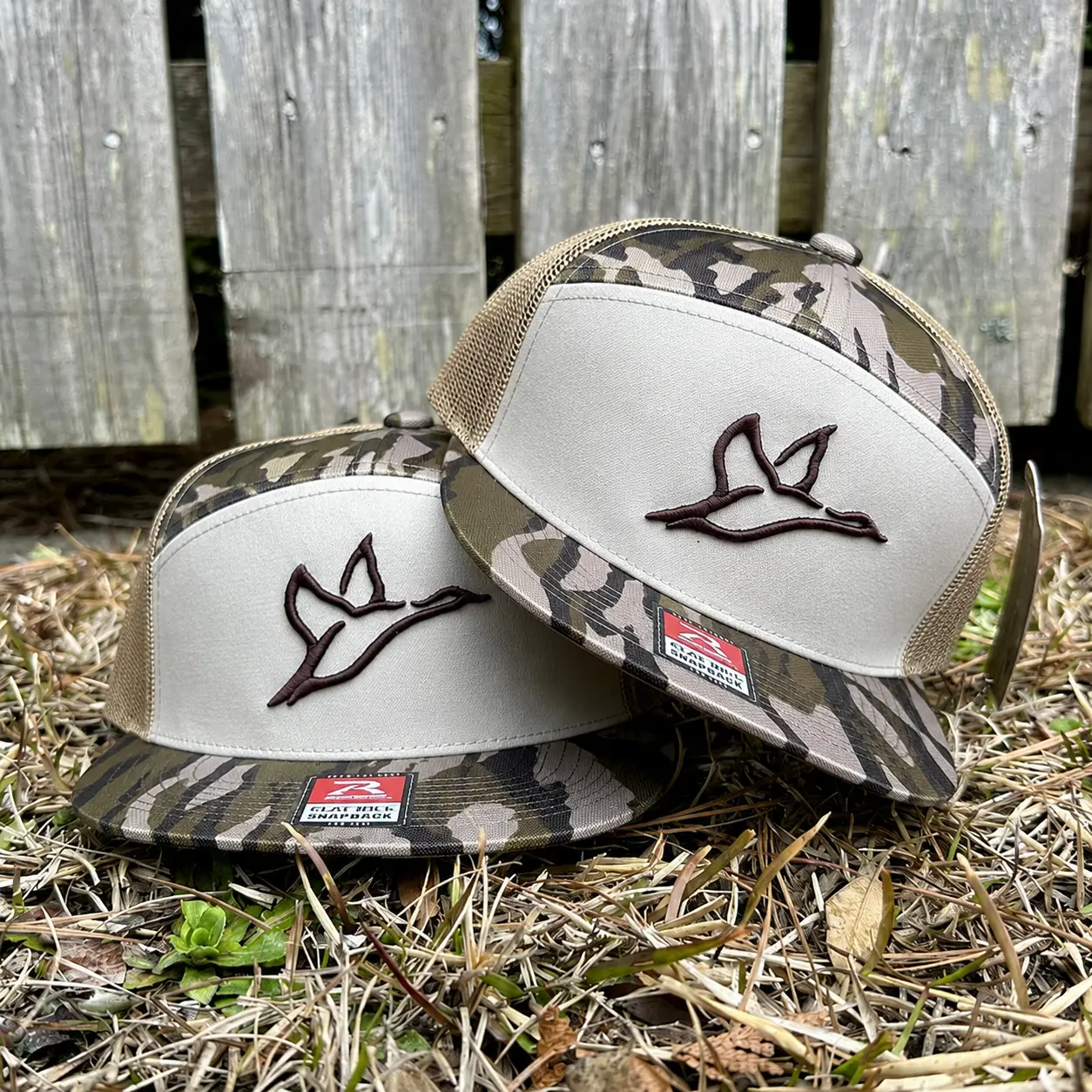 Duck Icon Flying Combat Waterfowl 7 Panel Khaiki/Brown White Black Bottomland Camo Snapback Trucker Hat, Embroidered Hunting Hat, Cotton Mesh Back