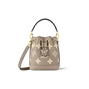 Women's Louis Vuitton Noé Nano Bucket Bag - Monogram-Printed Textured Calfskin, Drawstring Closure, Elephant Gray & Cream 2-Tone Cool-Toned Elegant Carry-All Drawstring Women's Handbag, Elegant Women's Handbags, 2-Tone Women's Handbags
