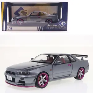 1999 Nissan Skyline GT-R (R34) RHD (Right Hand Drive) Silver Metallic with Purple Wheels 1:18 Diecast Model Car by Solido