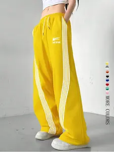 Women's Wide-Leg Track Pants, elastic drawstring waist with contrast side stripes, relaxed fit for streetwear, dance and casual daily wear, available in multiple colors including black, red, yellow and blue
