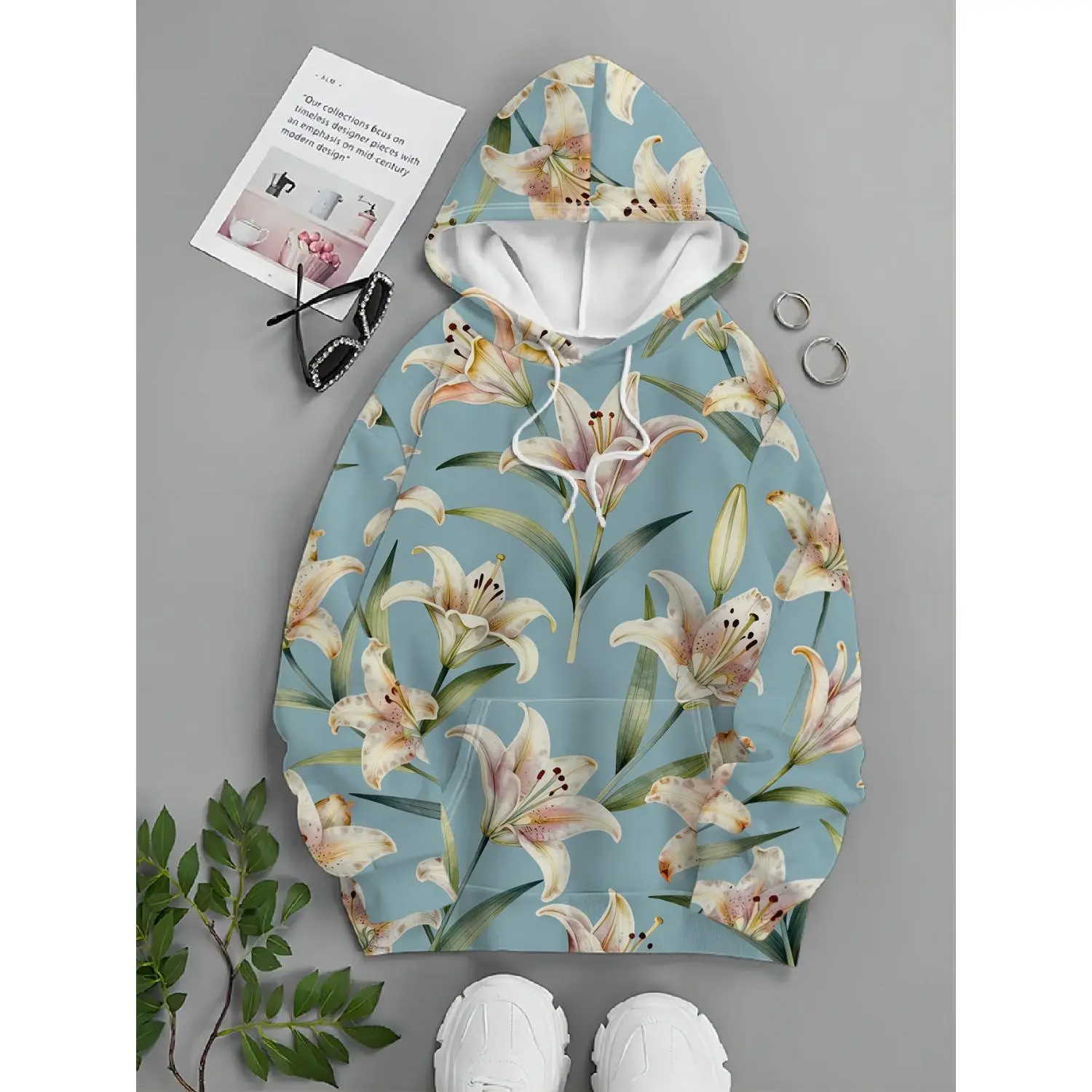 Unlock a New Era in Men's Streetwear: Trendy Pullover Hoodie with Fresh Floral Light Pink Lilies and Green Leaves on Light Blue Background