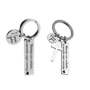 2pcs-Stainless Steel Engraved "Drive Safely" Keychain – Creative Couple's Car Pendant & Blessing Gift (Spanish)