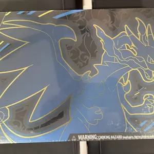 Pokémon 2025 Mega Evolution Charizard X ex Ultra-Premium Collection with 16 TCG Booster Packs 3 Foil Promo Cards Playmat Sleeves & Accessories