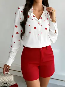 A fashionable white and red contrasting heart-shaped printed Long Sleeve Blouse shirt for women, with a striking contrasting design. The loose shirt covers the skin and is suitable for commuting to work, shopping, and outdoor wear