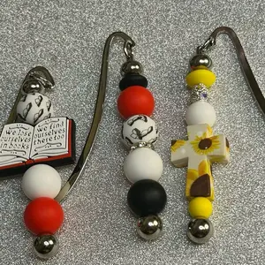 Beaded bookmarks. (Claim on Live) Choking hazard due to small parts and beads.