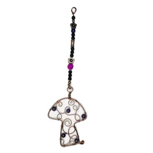 Handmade Aromatherapy Car Charm Hanger with Amethyst Beads interweaved in a Copper Wire Wrapped Mushroom. This charm hanger features lava stone to add your favorite essential oil for a natural way to make your car or any room smell incredible!