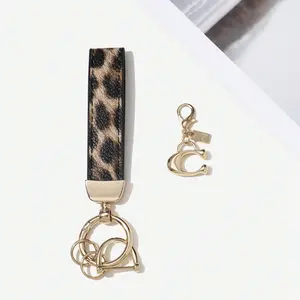 Leopard Print Keychain Set, C Letter Charm with Small Gold Tag, Car Key Decoration, Bag and Key Pendant, Versatile Accessory, Chic Leopard Pattern, Trendy Cute Keychain