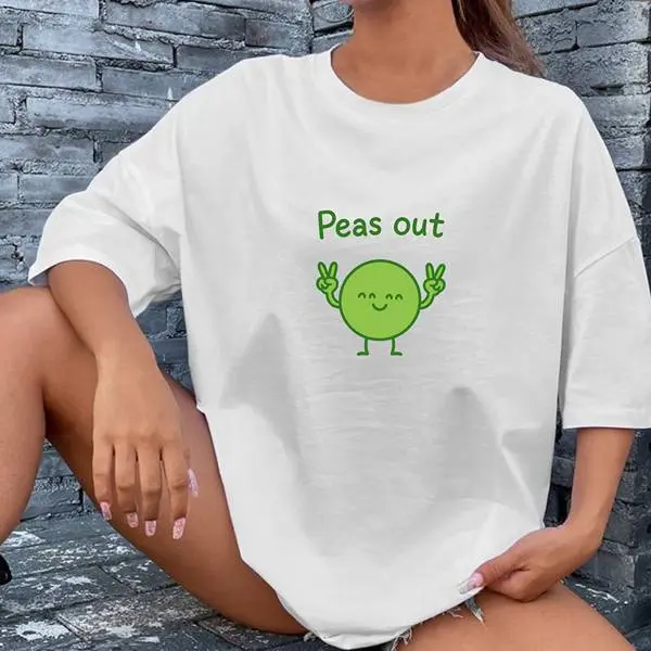 Peas Out T-Shirt – Funny Green Peas Graphic Tee with Peace Sign & Front Center Print, Soft Cotton Unisex Shirt in White & Black, Playful Pun Streetwear with Chill, Plant-Based Vibes