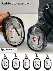 One portable mini transparent zippered storage bag, featuring a letter and flower design, transparent travel accessories, black, perfect for storing small items, Travel Organization Pouch. (Zip style and color are random, ring style and size are random.)